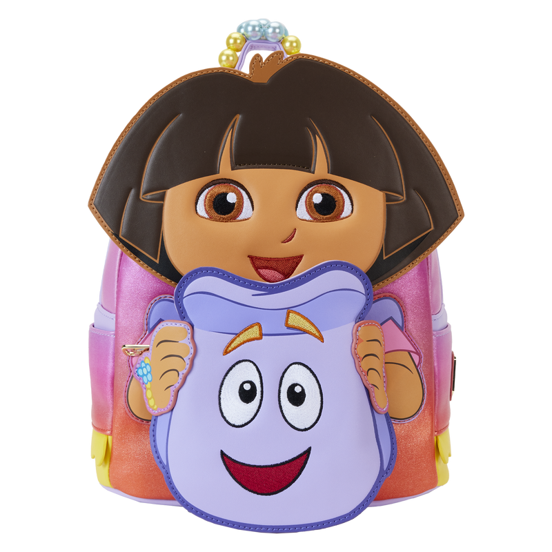 Loungefly Dora the Explorer Cosplay Mini Backpack featuring Dora as a large 3D appliqué holding her backpack, which doubles as a front pocket. Her outfit is made from a shimmery material. The backpack sits against a white background.